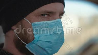 用医用口罩遮住人的脸，以防流感或冠状病毒，把头转向照相机。 科罗纳病毒