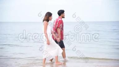 蜜月<strong>情侣</strong>漫步海滩浪漫关系幸福时刻与爱情<strong>生活</strong>方式。 <strong>情侣</strong>走了很长一段路