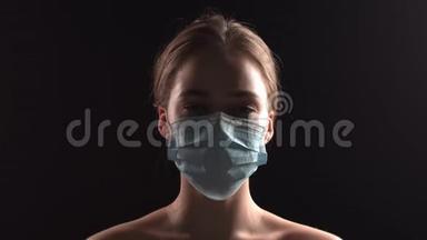 一个<strong>年</strong>轻的女孩或女医生病人戴着外科<strong>口罩</strong>，正在遭受致命的电晕病毒感染。