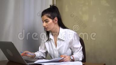 高级办公室工作人员完成文件截止日期，使用笔记本电脑，秘书