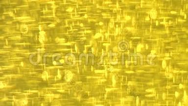 金色气泡慢慢上升。 黄金背景。 金色液体内部的大、小金泡油