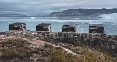 格陵兰岛EQIPSermia冰川Eqi冰川红屋的4K长<strong>时间</strong>移动<strong>时间</strong>间隔<strong>视频</strong>剪辑。 日落和日出