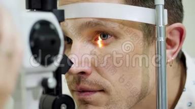 面部特写，在光学诊所用非接触式眼压计做眼科检查，切眼视力，眼压