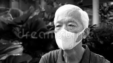戴口罩N95的中国老人，不受黑白冠状病毒感染