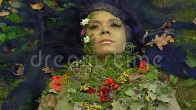 地球母亲躺在草地上哭泣，污染的概念和自然的痛苦