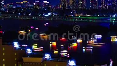 东京市区彩<strong>虹桥</strong>上船只倾斜的夜间时间