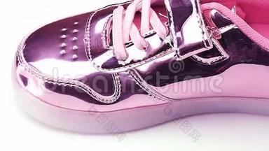 鞋时尚闪亮的粉红色儿童鞋旋转