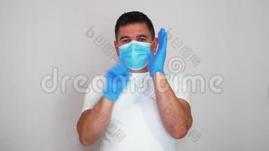 手册如何<strong>移除</strong>手套和口罩，以避免感染冠状病毒COVID-19。 防止感染
