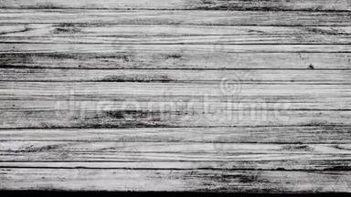 白色木制表面有裂缝，水平行白色<strong>木板</strong>向上移动在<strong>黑色背景</strong>上。 动画