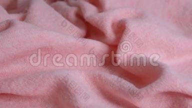 柔软的粉红色织物羊毛背景。 羊驼羊毛马海毛衣服纹理特写.. 天然羊绒柔软蓬松美利奴