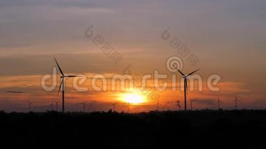 日落大气中发电、生态、清洁发电风力发电机组剪影风景