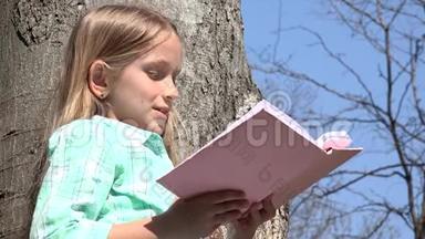树木公园的儿童阅读，自然户外的女学生阅读，教育