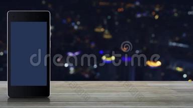 现代智能<strong>手机屏</strong>幕上的电话和电子邮件平面图标在木桌上，模糊的彩色夜光城市塔楼和SK