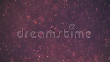 带有气泡混沌运动的抽象粉红色背景。 球旋转，抽象分子布朗运动。 坠落坠落
