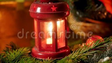 特写4k视频的来临灯笼与燃烧蜡烛在圣诞夜。 冬季庆典的完美镜头