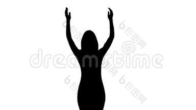 音乐会上的女人正在跳舞，双手拍手。 白色背景。 剪影