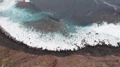 <strong>史诗级</strong>无人机视频-海滩与黑色石头和绿松石水。 西班牙加那利群岛特内里费埃尔普里斯
