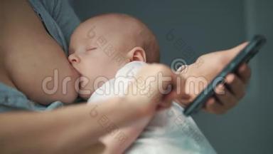 母乳喂养新生婴儿时使用手机关闭妇女