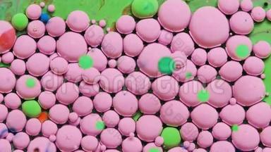绿色和粉红色的<strong>油墨</strong>反应形成一个美丽的结构<strong>油漆</strong>气泡。