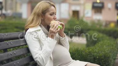 孕妇在<strong>吃汉堡</strong>时会感到恶心，早上会有毒血症，健康