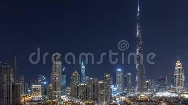 迪拜市中心的天际线在整个晚上与<strong>哈利</strong>法塔和其他塔的全景从顶部。