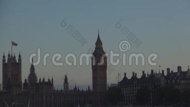 伦敦城市形象与威斯敏斯特宫和大本钟塔剪影黑暗