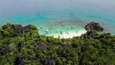 有白色沙滩的热带岛屿。菲律宾，马图卡德，卡拉莫安群岛。
