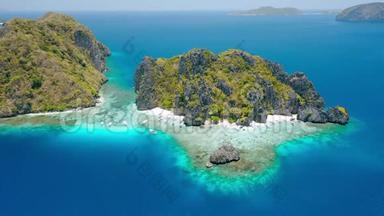 菲律宾巴拉望岛ElNido清水岛的空中无人机镜头。 岩石和晶莹剔透的绿松石