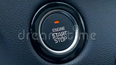汽车`的点火按钮被按下以启动和停止车辆