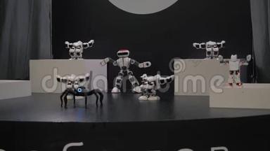 人形机器人舞蹈。 一群可爱的机器人跳舞。 特写智能机器人舞蹈秀.. 4k人体机器人舞蹈