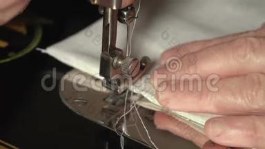 女士手在缝纫机上横向特写慢动作MF