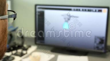 牙科技师在实验室制作电脑下巴模型，特写侧视