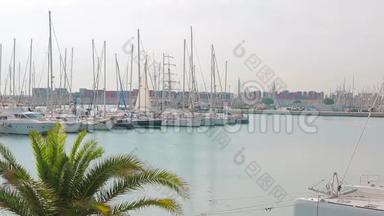 巴伦西亚港，帆船和游艇的所在地。 上午在港口旅游地，靠近帆船行走