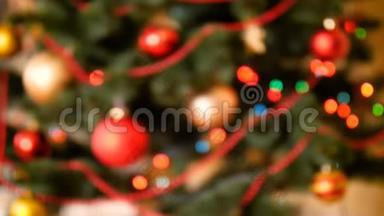 4k片装饰圣诞树和彩灯的模糊镜头