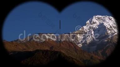 尼泊尔<strong>喜马拉雅</strong>山脉的安纳普尔纳山脉是通过望远镜看到的。 徒步旅行、登山和徒步旅行
