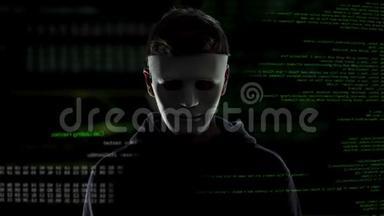 戴着面具的恐怖黑客戴上黑帽子，网络恐怖主义和黑客攻击