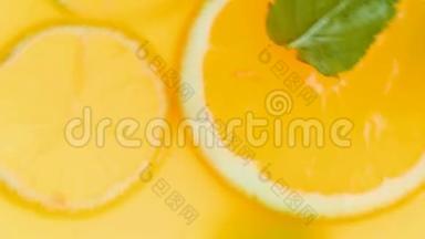 宏4k视频混合和制作柠檬水与新鲜橙子和薄荷叶