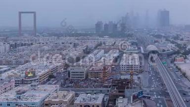 白天到夜间沙尘暴期间迪拜城市景观