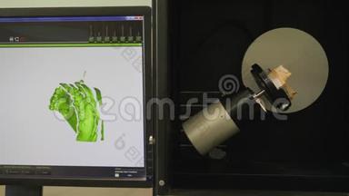 医学实验室，现代丹蒂斯特仪器扫描人造颚，并在电脑显示器上显示