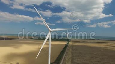 风机构是一种替代能源的背景上的黄绿色层的正面视图。 航空测量