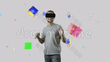 在互动空间内佩戴VR设备眼镜的人触摸虚拟立方体
