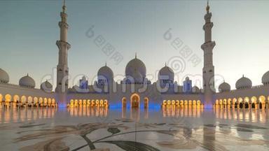 阿联酋ABUDHABI-2017年5月：阿拉伯联合酋长国阿布扎比谢赫扎耶德清真寺日落时间。 过渡