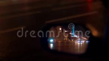 夜间城市灯光及交通背景.. 车侧镜反射..