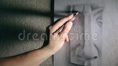 艺术家用石墨铅笔画鼻子
