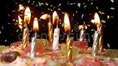 生日蛋糕和纸屑上的蜡烛