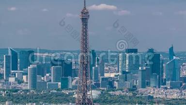 从蒙帕纳斯塔和埃菲尔铁塔和拉防卫区的背景时间在巴黎，法国。