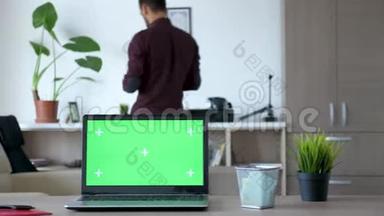 笔记本电脑桌面上有一个独立的彩色绿色屏幕