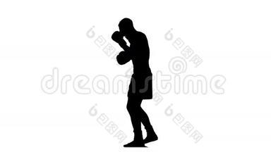 在重要比<strong>赛前</strong>训练拳击手。 黑色轮廓
