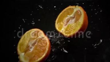 下落和分裂橙色的超慢动作视频