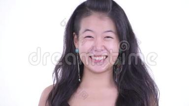 脸上洋溢着幸福美丽的亚洲女人的笑容
